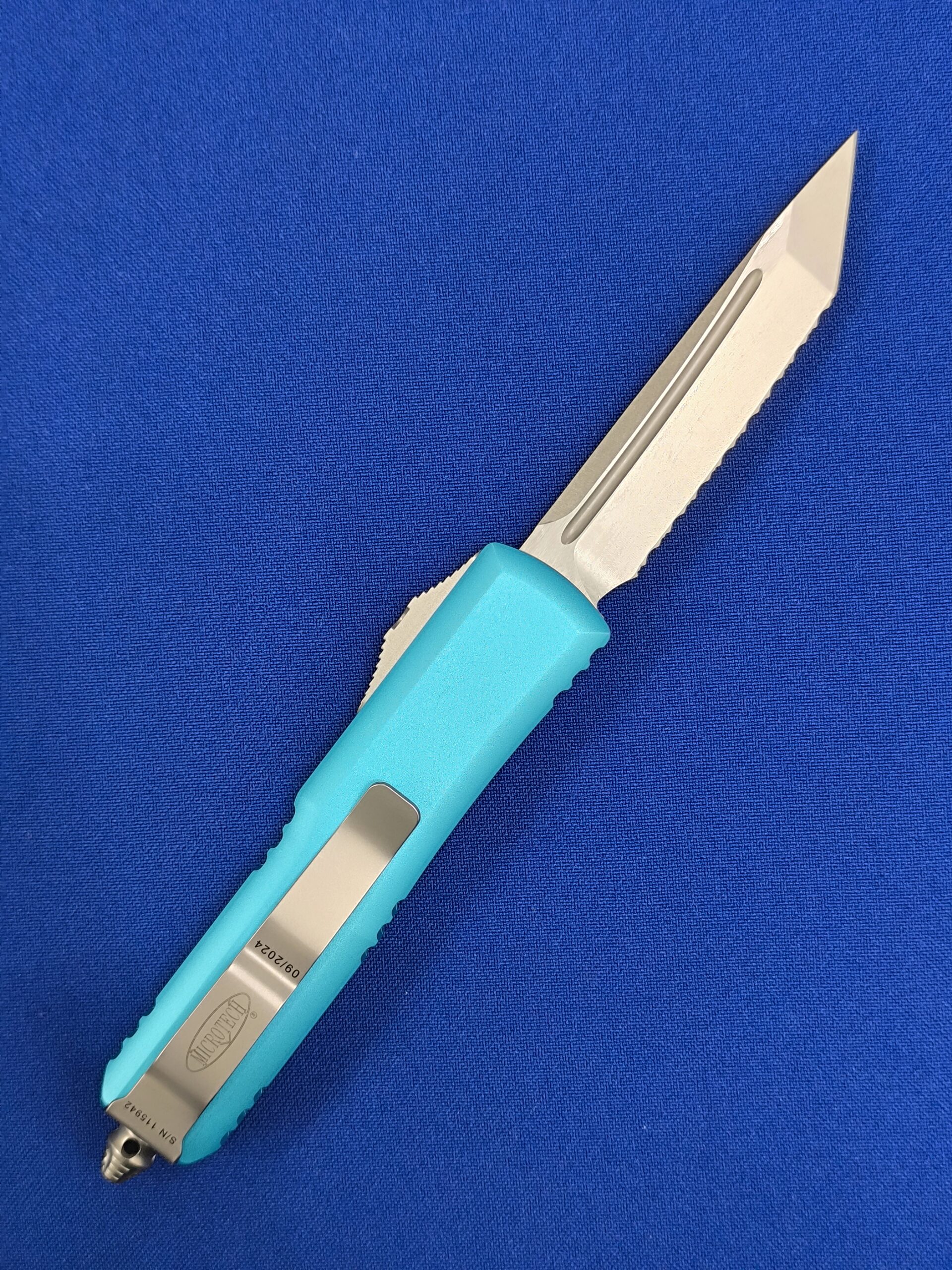Фронтальный нож Microtech UTX-85 T/E Turguoise 233-12 TQ, сталь M390