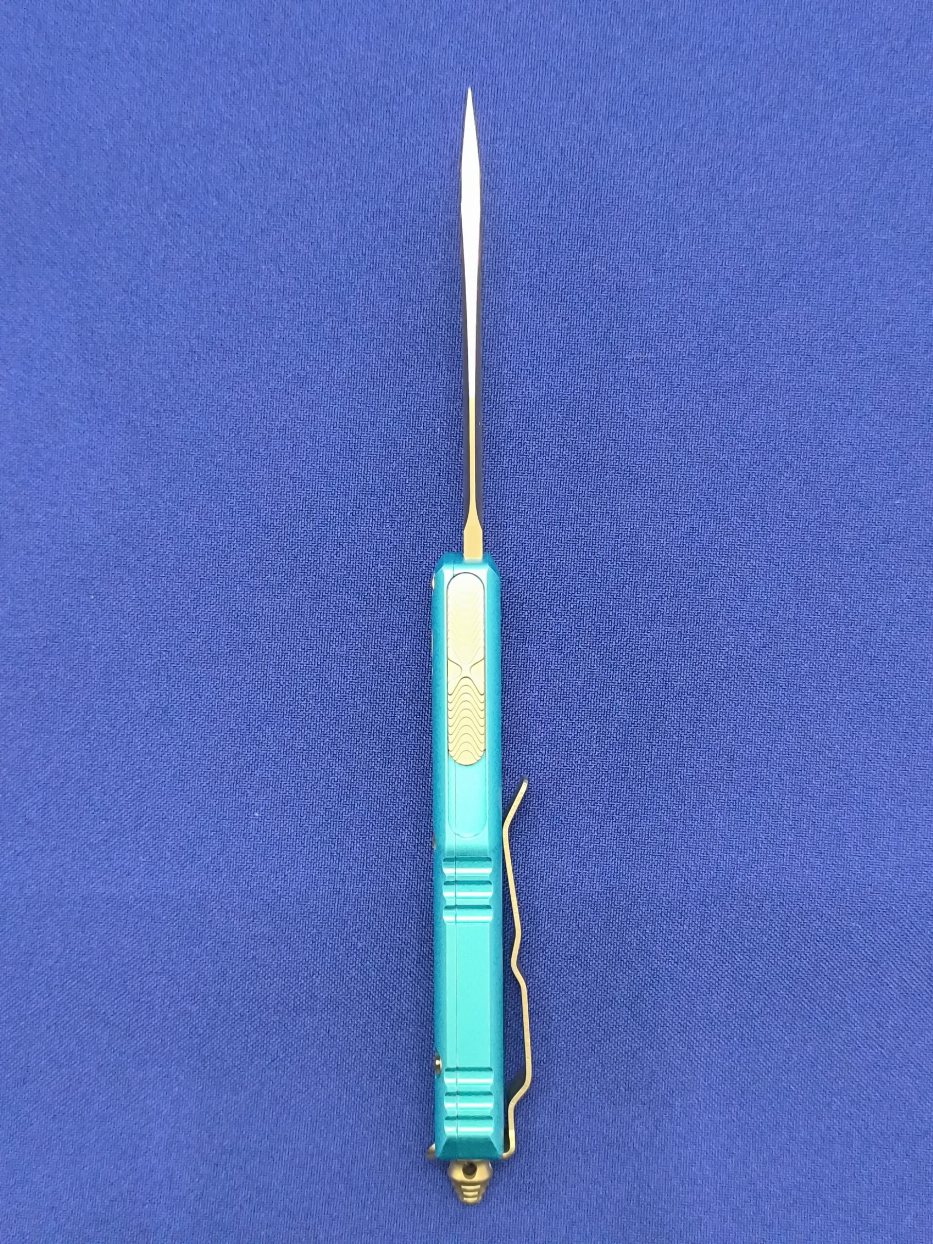 Фронтальный нож Microtech UTX-85 T/E Turguoise 233-12 TQ, сталь M390