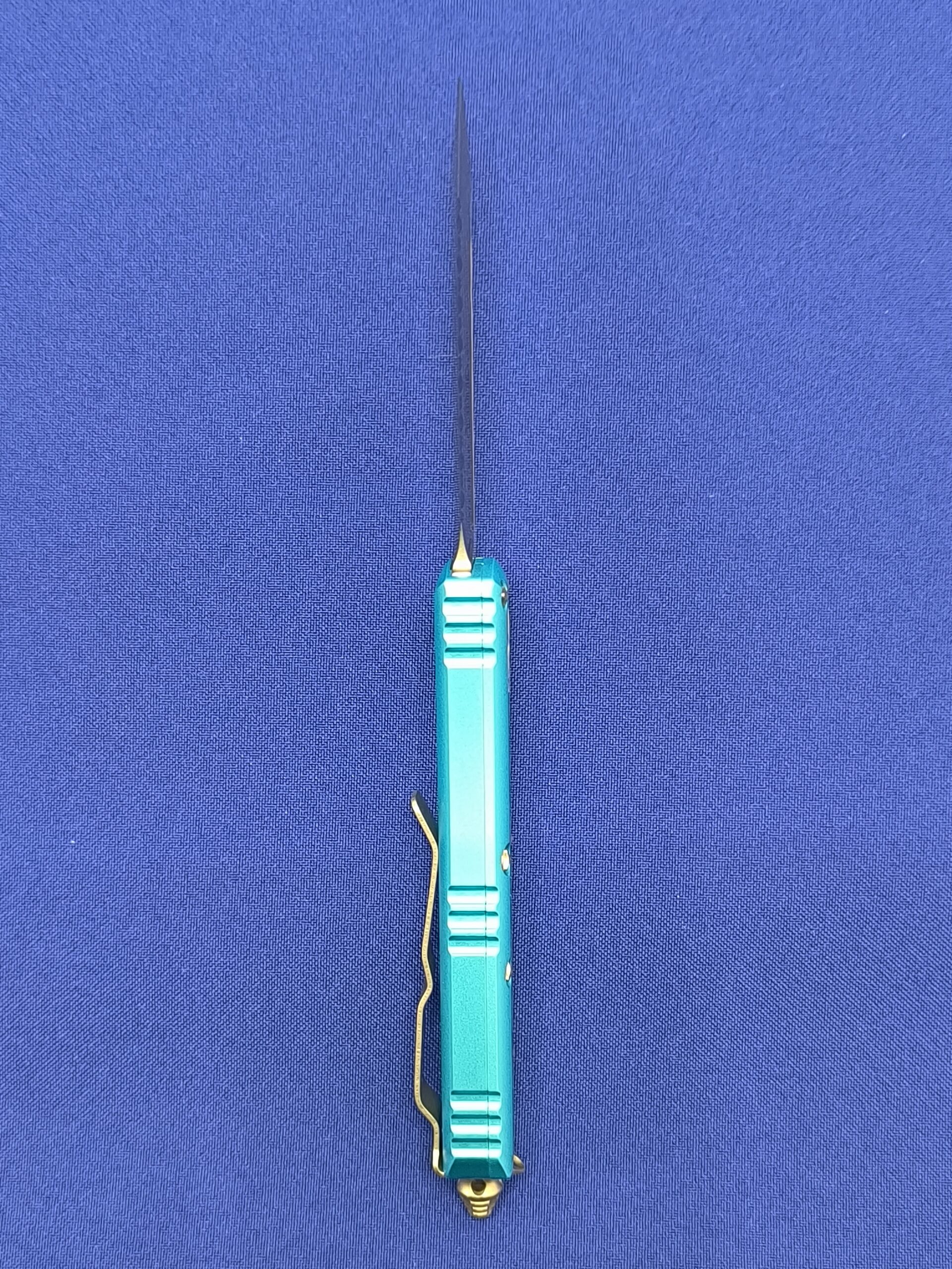 Фронтальный нож Microtech UTX-85 T/E Turguoise 233-12 TQ, сталь M390