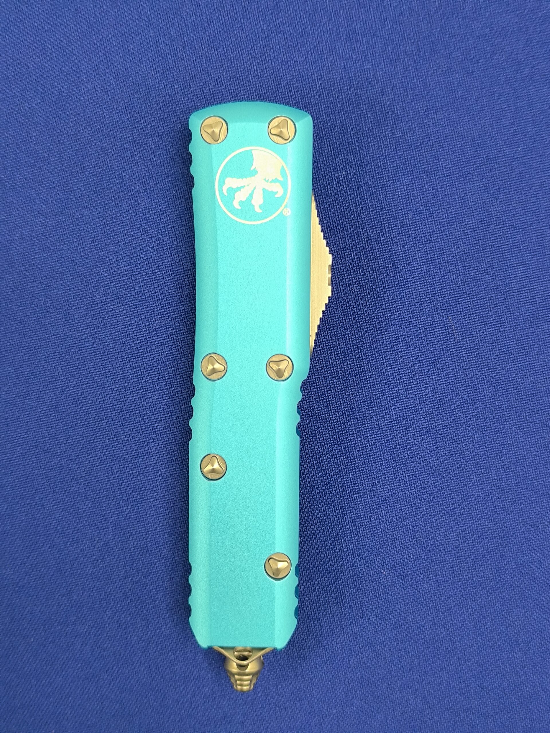 Фронтальный нож Microtech UTX-85 T/E Turguoise 233-12 TQ, сталь M390