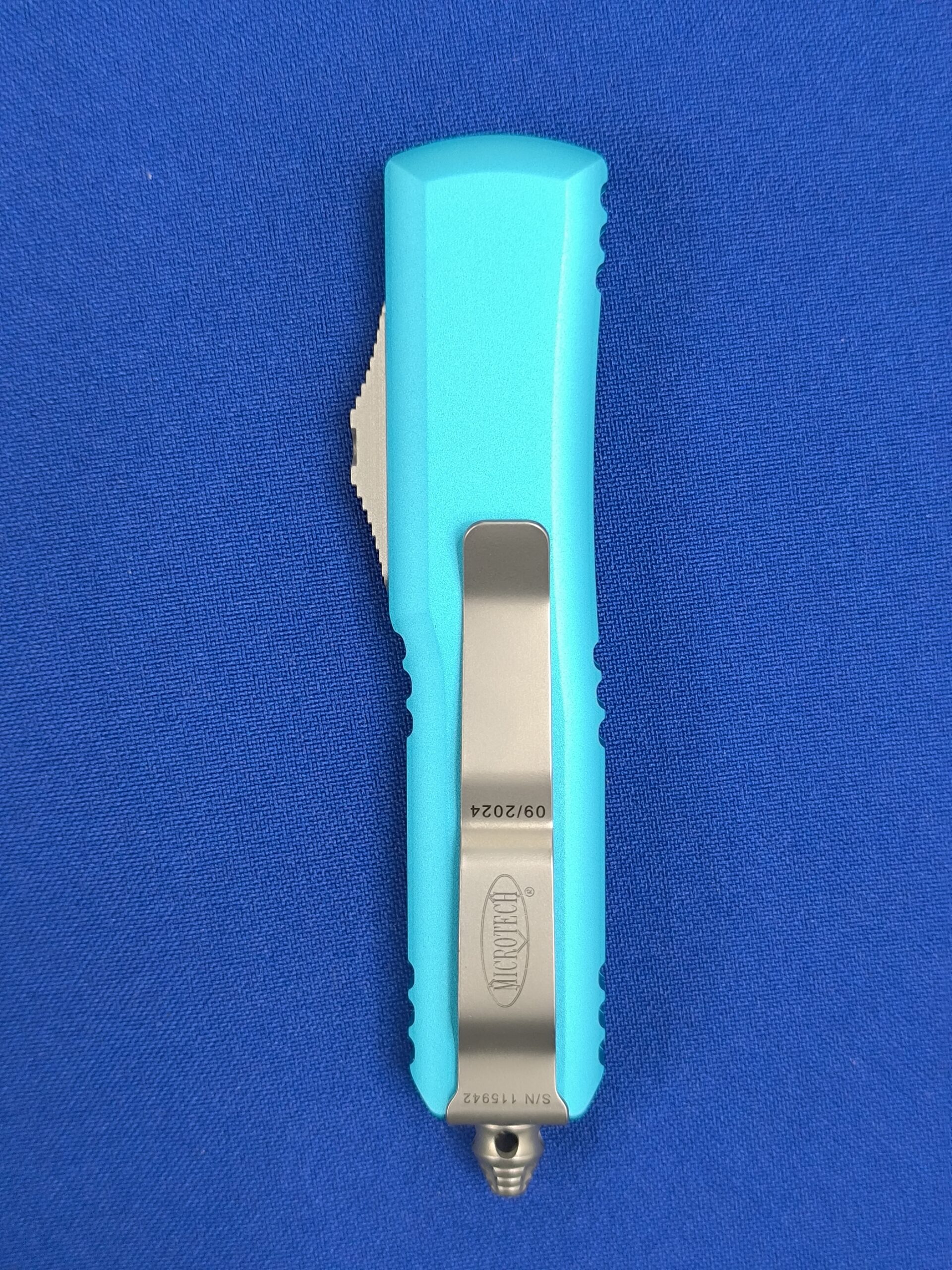 Фронтальный нож Microtech UTX-85 T/E Turguoise 233-12 TQ, сталь M390